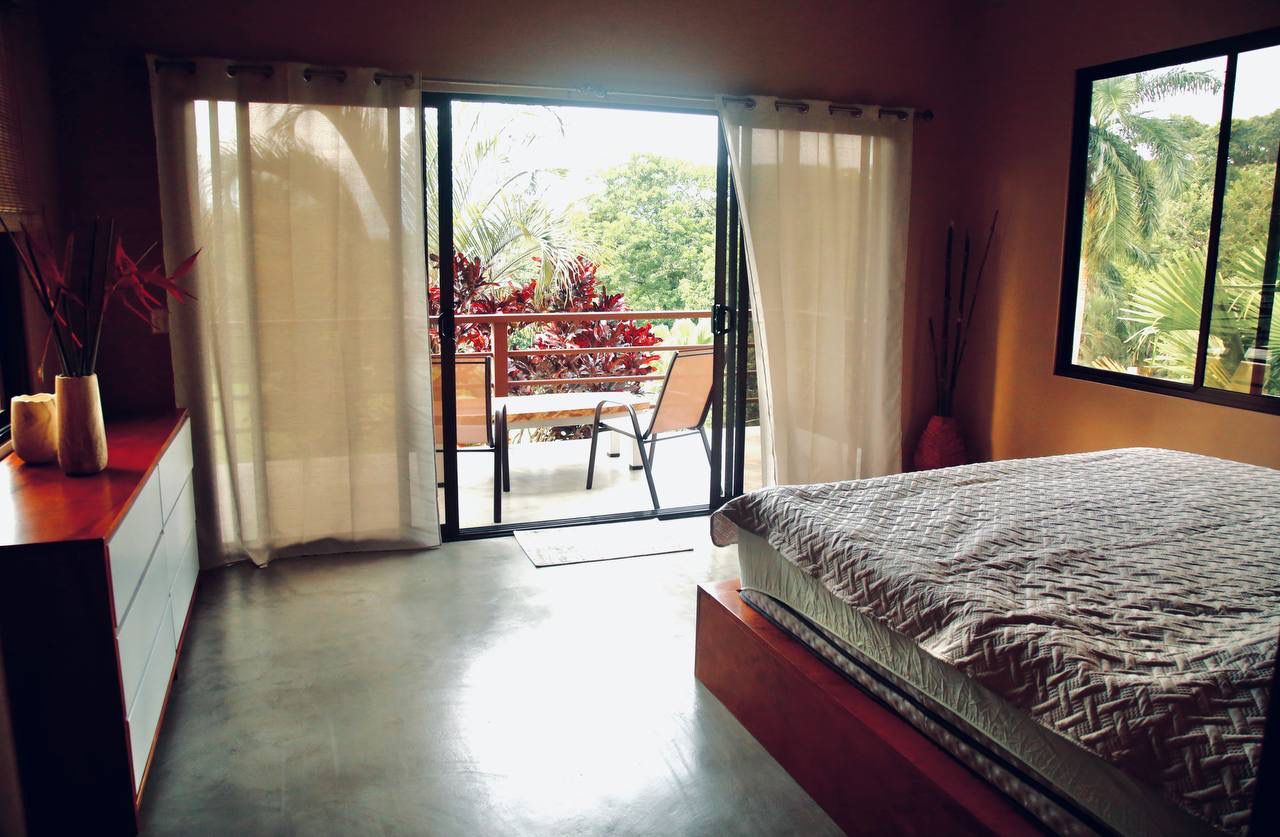 Bedroom with private terrace overlooking gardens