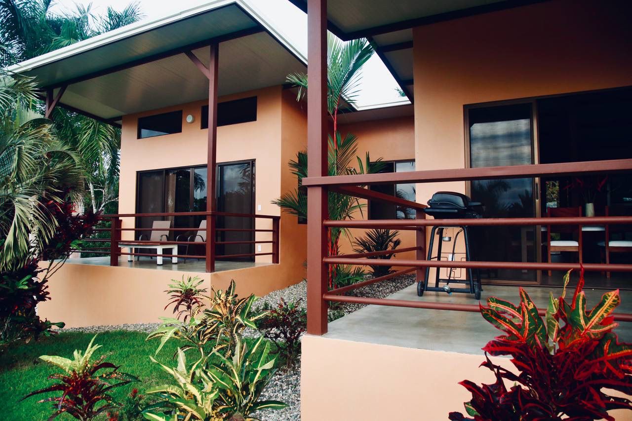 Villa exterior close-up with tropical landscaping