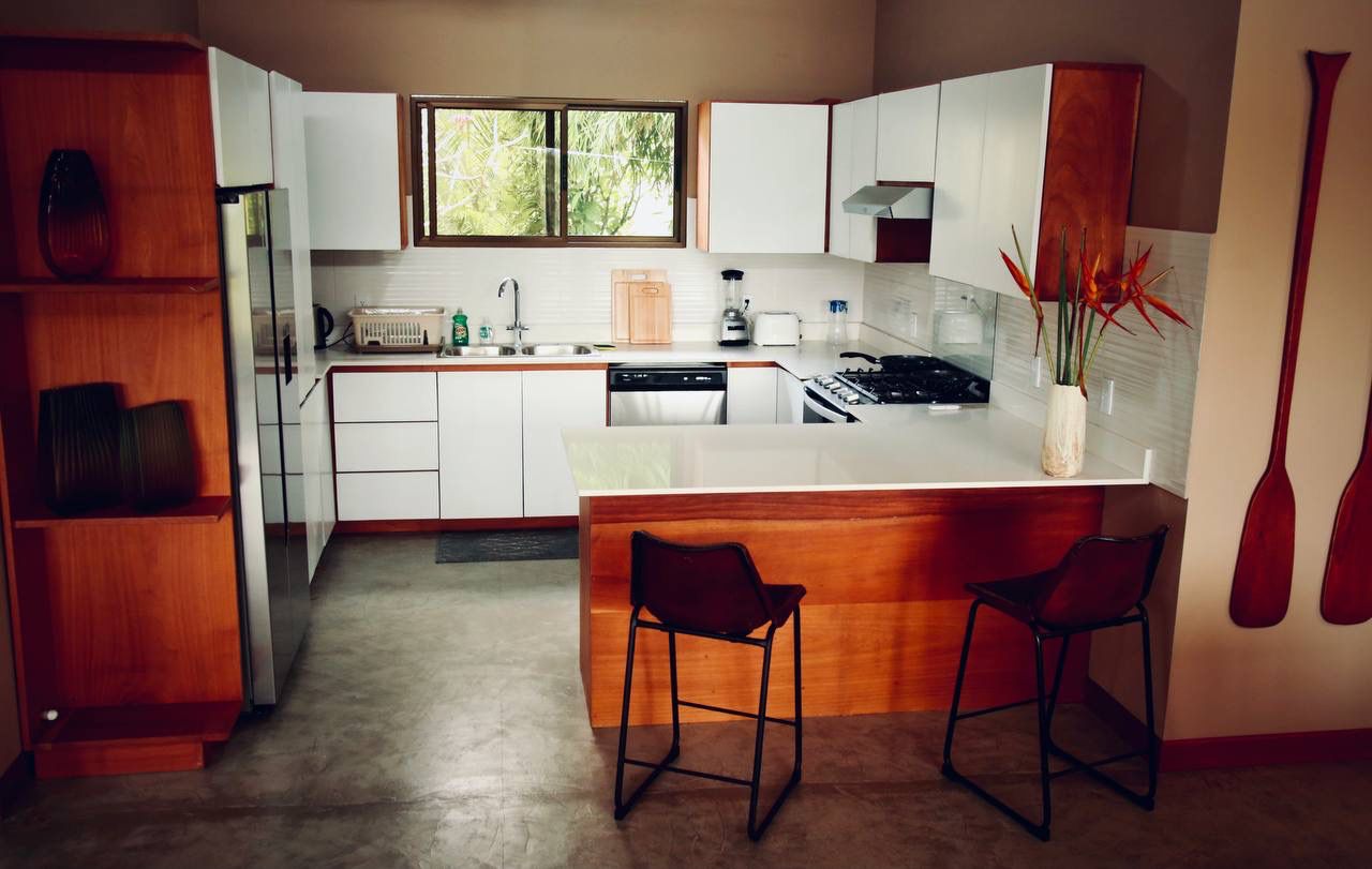 Kitchen with tropical hardwood cabinetry